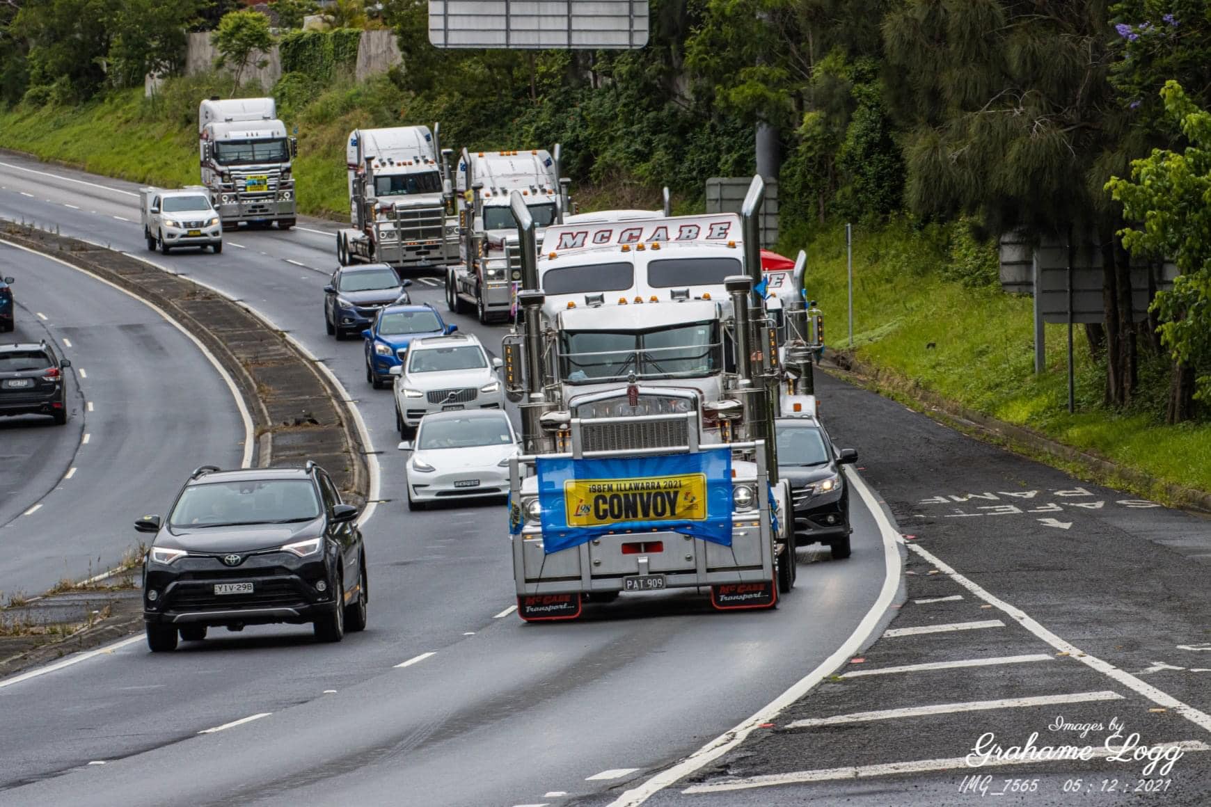 Tony and his sons leading the McCabe trucks